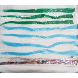 one tinsel, three  green, four blue hair clip-ins